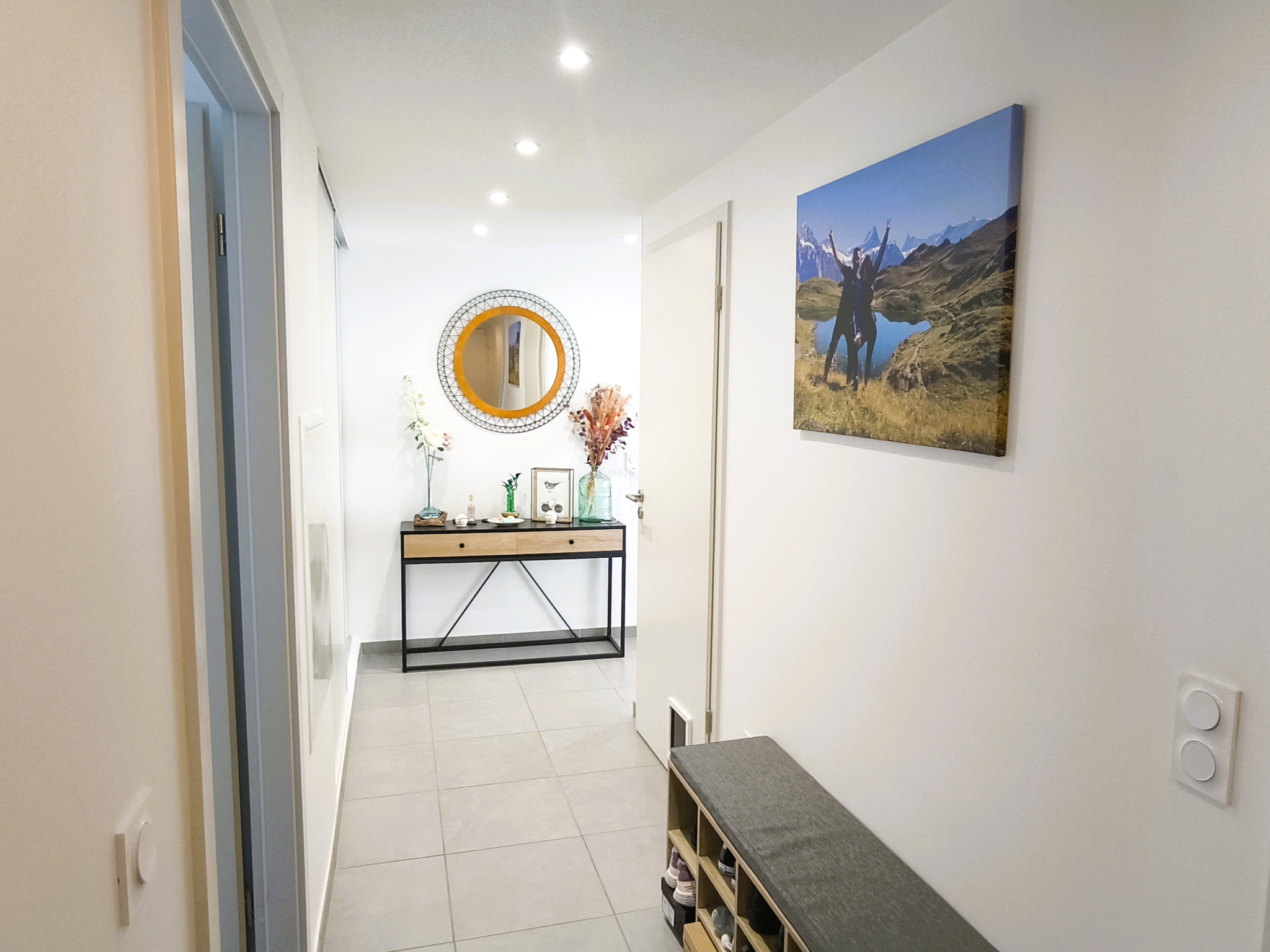 Appartement 3 pièces 65 m2   Lumineux avec véranda, double garage et cave